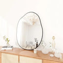 Asymmetric wall mirror